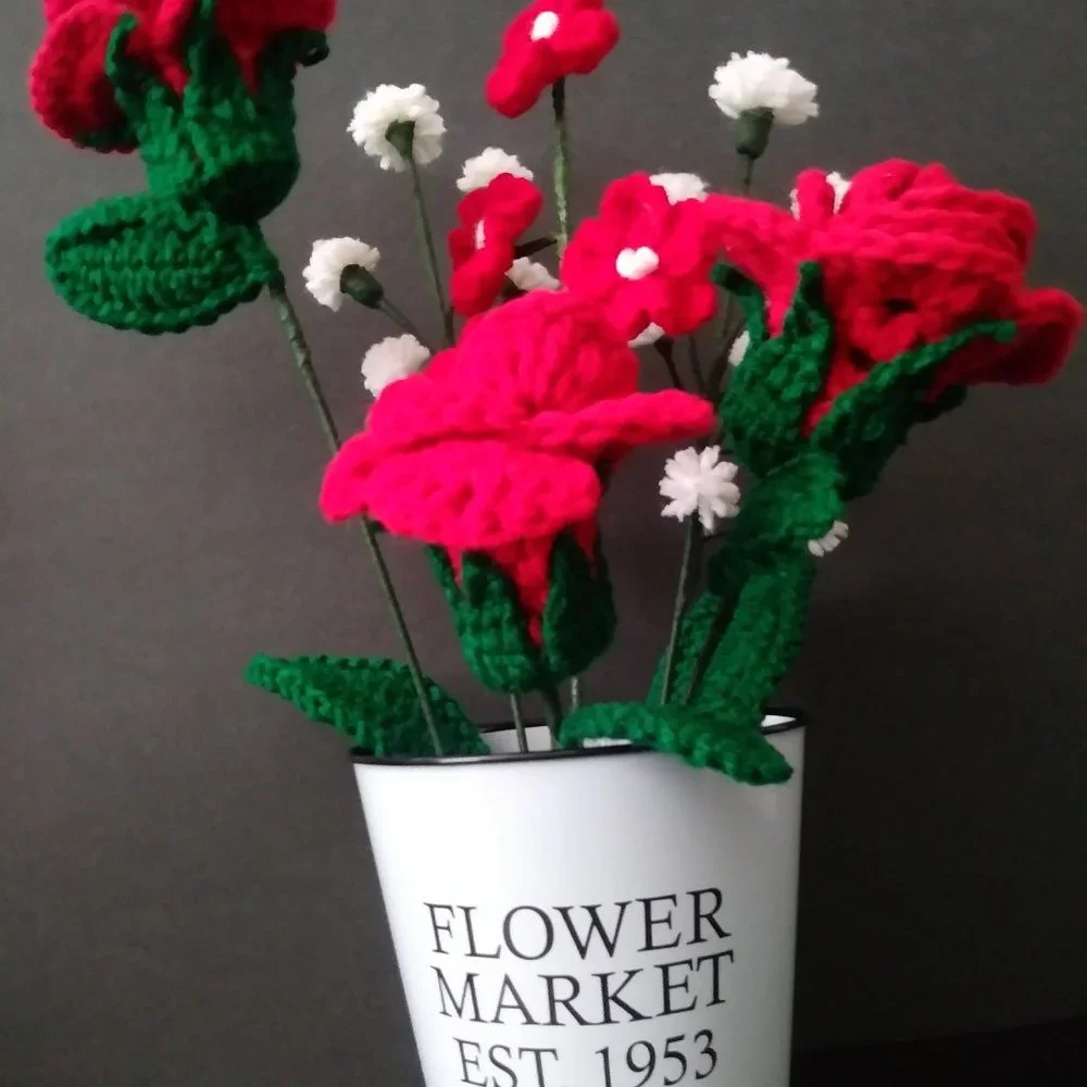 Handmade crochet bouquet of red roses,